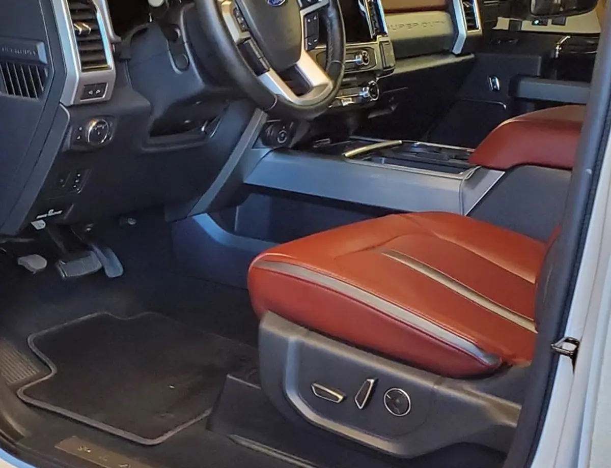 After: clean Ford F-150 driver floor and mats